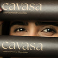 Woman holding a Cavasa dragée tube – Luxury Artisanal Chocolates